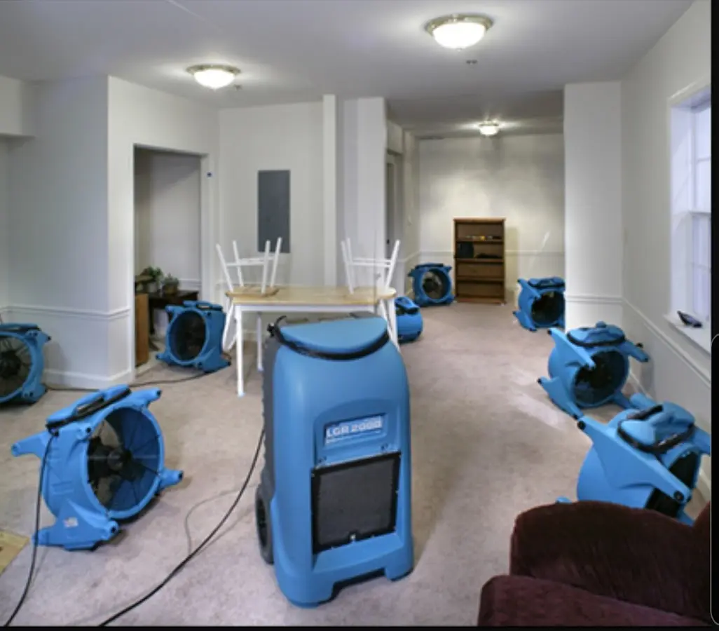 Air movers and dehumidifier setup for Water Damage Restoration in McComb